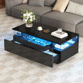 Couchtisch in Hochglanz Schwarz mit LED-Beleuchtung, 2 Schubladen, Glasplatte und herausnehmbarem Tablett, 90 ¡Á 45 ¡Á 35,5 cm